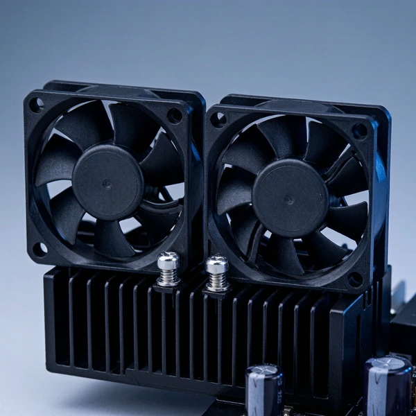 Inverter cabinet cross-section showing axial fan and centrifugal blower airflow paths